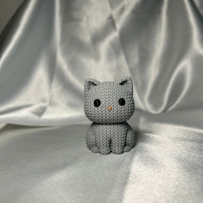 Kätzchen in Strickoptik in grau