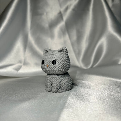 Kätzchen in Strickoptik in grau