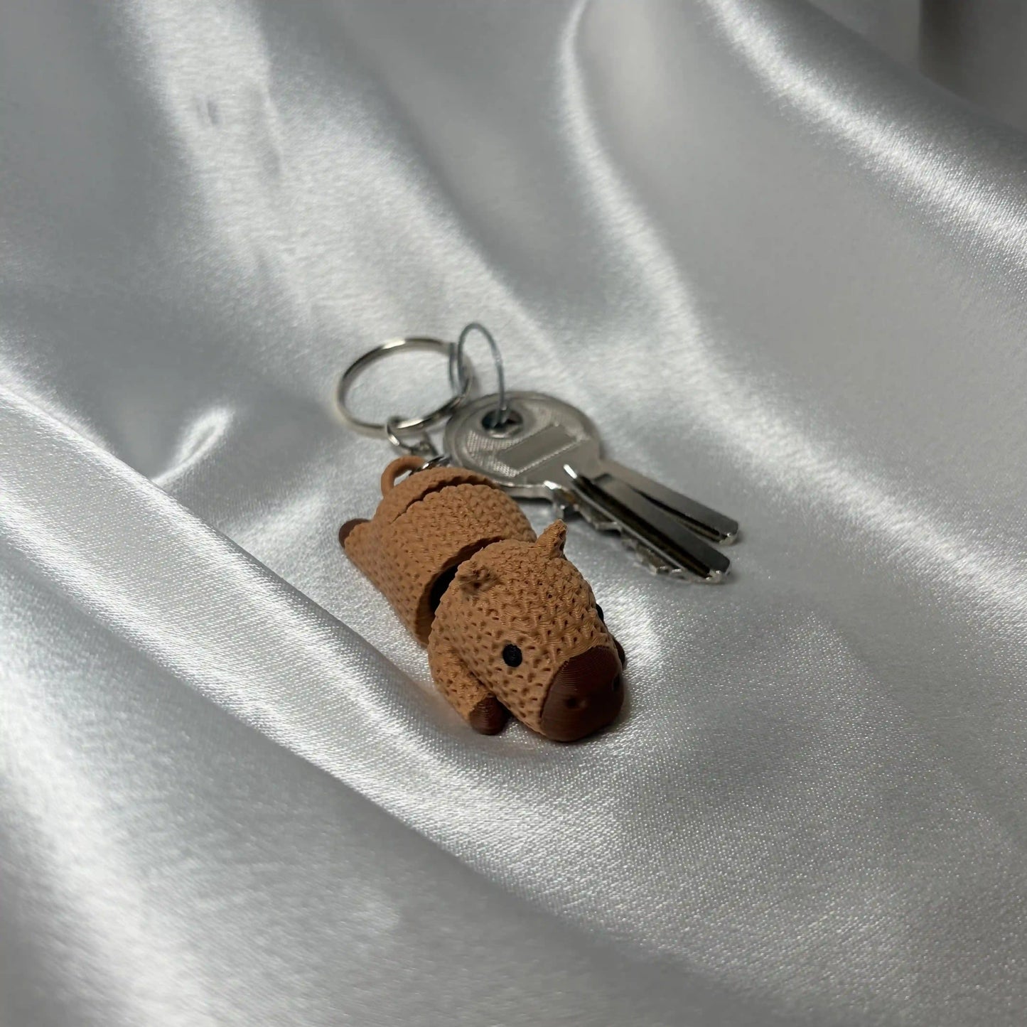 Capybara Schlüssel-und Taschenanhänger beweglich in Strickoptik