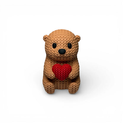 Otter mit Herz Figur in Strickoptik