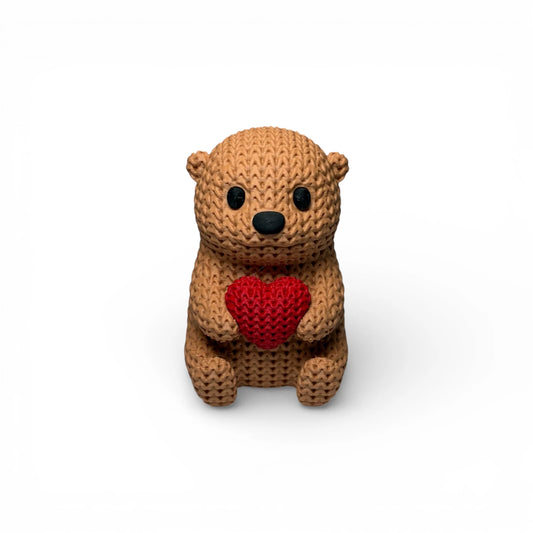 Otter mit Herz Figur in Strickoptik