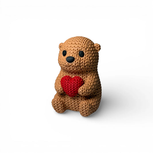 Otter mit Herz Figur in Strickoptik