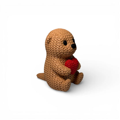 Otter mit Herz Figur in Strickoptik